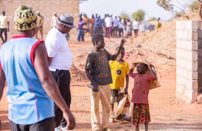Above Many children know nothing of the outside world or school — growing up in a chaotic space where danger, labour and survival are mixed together.